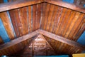 Roof view from the inside,wooden roof rafters inside, metal roofing Royalty Free Stock Photo