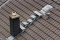 Roof window and metal steps for chimney maintenance and cleaning Royalty Free Stock Photo