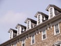 Roof windows stone building Royalty Free Stock Photo