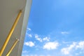 The roof with yellow pillars and blue sky with some cloud. Very suitable for use as background