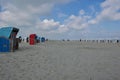 Roofed wicker beach chairs