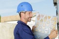 roofer builder worker looking tiles oudtoors Royalty Free Stock Photo