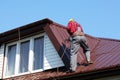 Roofer builder worker on roof