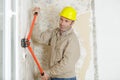 roofer builder worker using special pliers Royalty Free Stock Photo