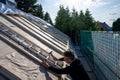 Roofer fixing new insulation on the roof of a old house Royalty Free Stock Photo