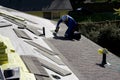 Roofer fixing roofing new roof Royalty Free Stock Photo