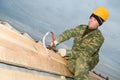 Roofer with hand snips