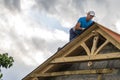 Roofer man roof carpenter working Country house renovation Royalty Free Stock Photo