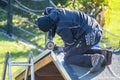 Roofer repairing the metal facing after storm