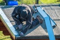 Roofer worker using battery-powered gun