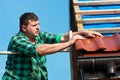 Roofer working