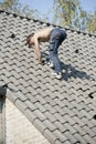 Roofer working on a roof