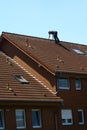 Roofer is working on a roof