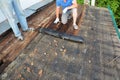Roofers roof repair and renovation. Old house roof with bad wet wooden beams and  wet roock wool insulation material. Roofing Royalty Free Stock Photo