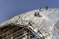 Roofers, tied with ropes working on the roof 1 Royalty Free Stock Photo