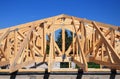 Roofing Construction. Wooden roof frame house construction with wooden roof beams, trusses, timber Royalty Free Stock Photo