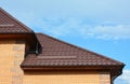 Roofing with New House Rain Gutter Waterproofing. Guttering Down pipe Fittings.