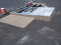 Roofing repairs in progress on Commercial EPDM roof; AC curb wrapping