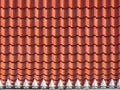 Roofing texture. Red corrugated tile element of roof. Royalty Free Stock Photo