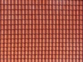 Roofing texture. Red corrugated tile element of roof. Royalty Free Stock Photo