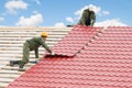 Roofing work with metal tile Royalty Free Stock Photo
