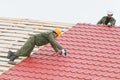 Roofing work with metal tile