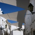 Architecture, faro, portugal, white houses, blue sky, overwinter Royalty Free Stock Photo