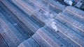 Roofs of Factory buildings in heavy industrial with white smoke Royalty Free Stock Photo