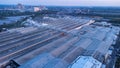 Roofs of Factory buildings in heavy industrial with white smoke Royalty Free Stock Photo