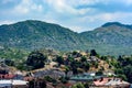 Roofs of houses in the background of mountains. View of the city of Cetinje, Montenegro Royalty Free Stock Photo