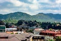 Roofs of houses in the background of mountains. View of the city of Cetinje, Montenegro Royalty Free Stock Photo