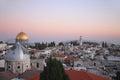 The roofs of the old city of Jerusalem at sunset,