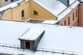 Roofs of urban houses in snow