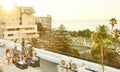 Rooftop barbaque at sunset with group of attractive young adults