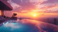 Rooftop Infinity Pool with Sunset View over Cityscape Royalty Free Stock Photo