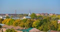 Rooftop Kronstadt view from belltower of Naval Cathedral of Saint Nicholas in golden autumn day with dam on background Royalty Free Stock Photo