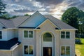 Rooftop in a newly home constructed showing asphalt shingles multiple roof lines Royalty Free Stock Photo