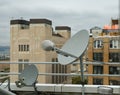 Rooftop Satellite Dishes Royalty Free Stock Photo