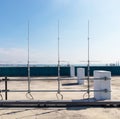 Rooftop small radio communication tower antenna and television. Is device that converts electricity into electromagnetic waves. Royalty Free Stock Photo