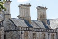 Rooftop stacks on medieval building. Close-up of historic roof detail