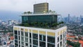 Rooftop terrace on the roof of high-rise apartment building in Jakarta. Recreation area on Roof of Skyscraper. Modern Royalty Free Stock Photo