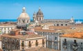 Rooftop view in Catania, with the domes of the Church of the Badia di Sant`Agata and the Sant`Agata Cathedral. Sicily, Italy. Royalty Free Stock Photo