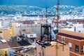 Rooftop View of Denia\'s Townscape with Bell and Distant Mountains Royalty Free Stock Photo