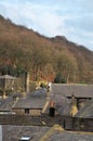 View of rows of traditional terraced streets and stone houses in hebden bridge west yorkshire and surrounding woodland