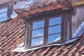 Rooftop window. Royalty Free Stock Photo