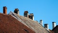 Rooftops and chimneys - Blue sky Royalty Free Stock Photo