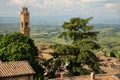 Rooftops and clock tower of Palazzo dei Priori in Montalcino, Va Royalty Free Stock Photo