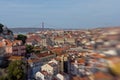 Rooftops of the houses of Lisbon and Carmo convent ruin, with Tagus river in the background, artistic impression with Lensbaby len Royalty Free Stock Photo