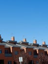 Rooftops of houses in suburban district Ensanche de Vallecas in Madrid, Spain. Vertical photo
