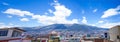 Rooftops with Pichincha volcano in the background Royalty Free Stock Photo
